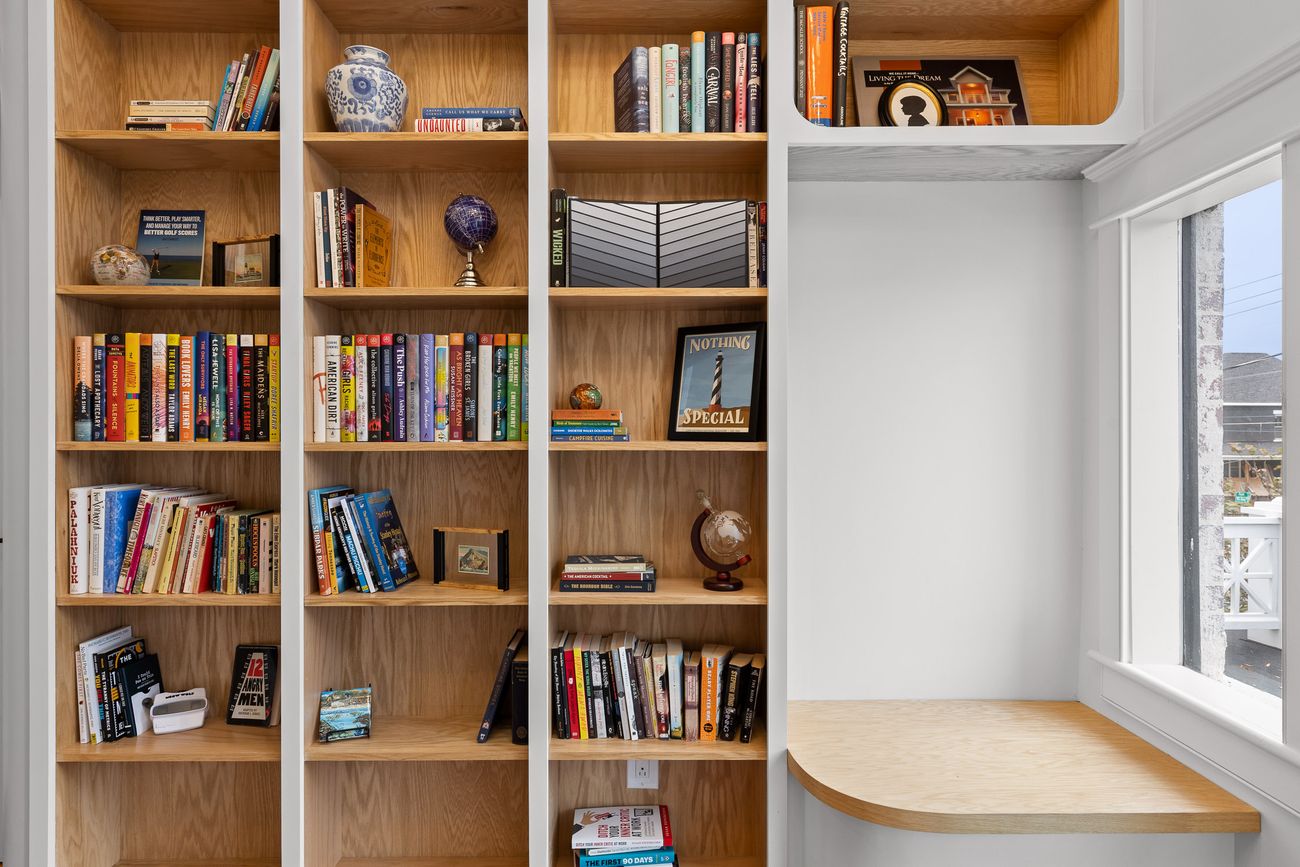 Custom timber shelving and built-in cabinetry