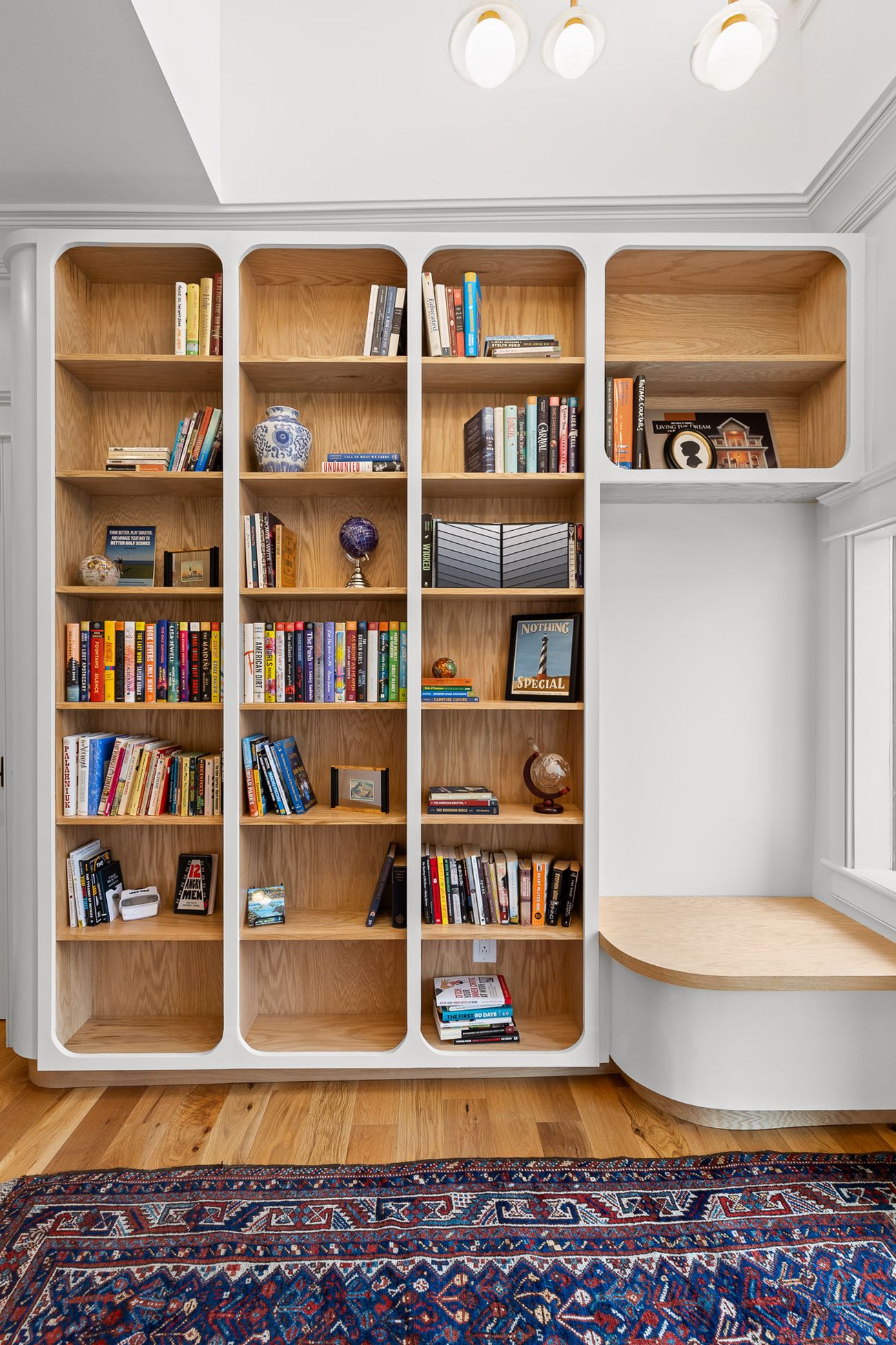 Built-in library shelving in solid timber