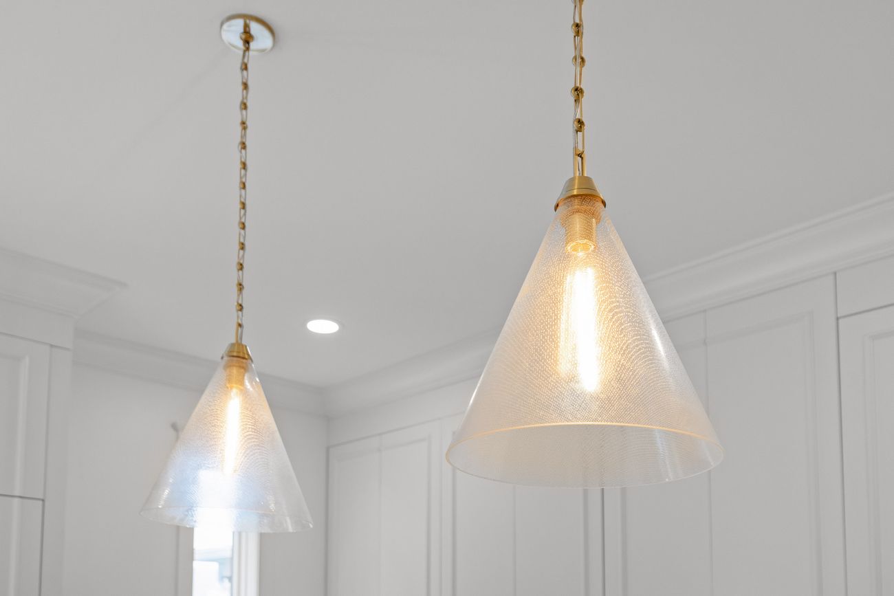 Custom kitchen island with brushed brass hardware